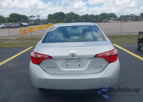 2018 Toyota Corolla Le z USA, uszkodzony, nr VIN 5YFBURHEXJP811345